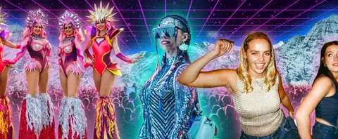 A group of people in vibrant costumes dance under a neon grid sky.